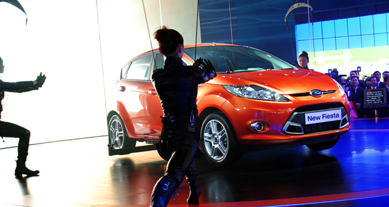 Illustration for article titled 2009 Ford Fiesta Gets Cirque Du Soleil'd In Shanghai